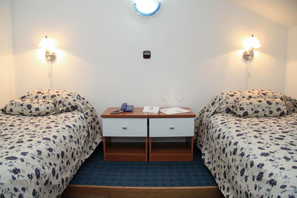Postel nebo postele na pokoji v ubytování Hotel Villa Neretva - Metković