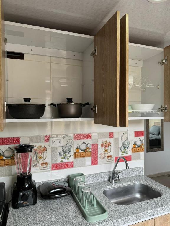 Kuchyň nebo kuchyňský kout v ubytování Hostelfc Chapinero