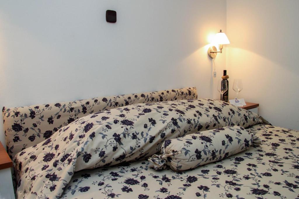 Postel nebo postele na pokoji v ubytování Hotel Villa Neretva - Metković