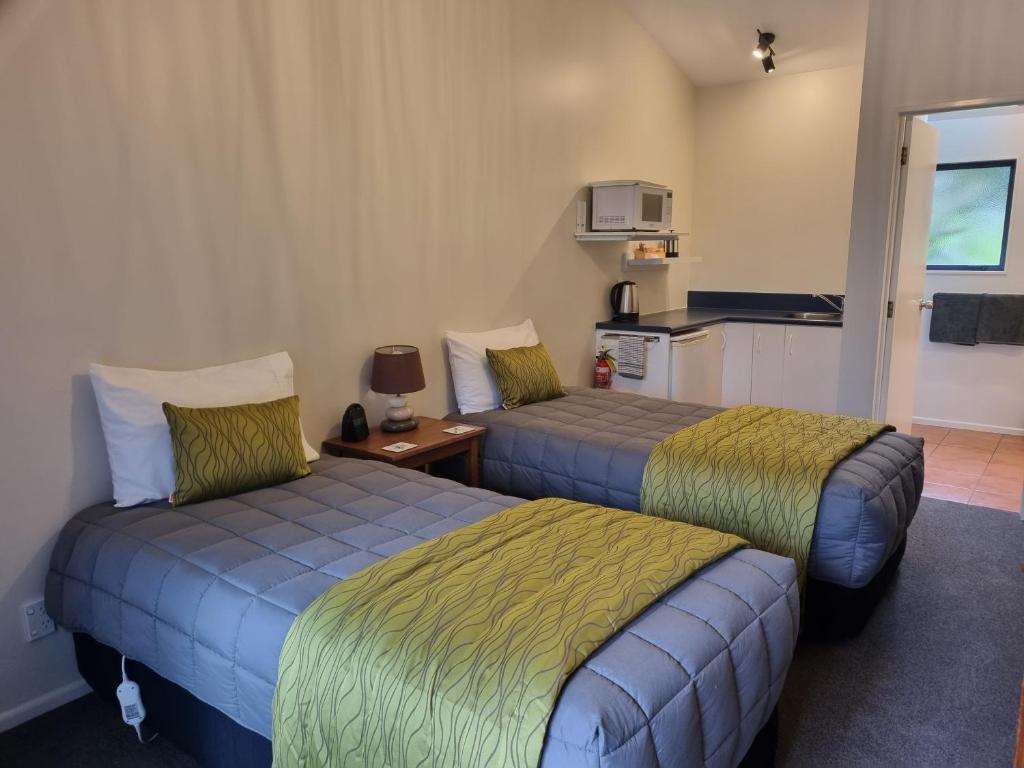 Postel nebo postele na pokoji v ubytování Havelock Garden Motel