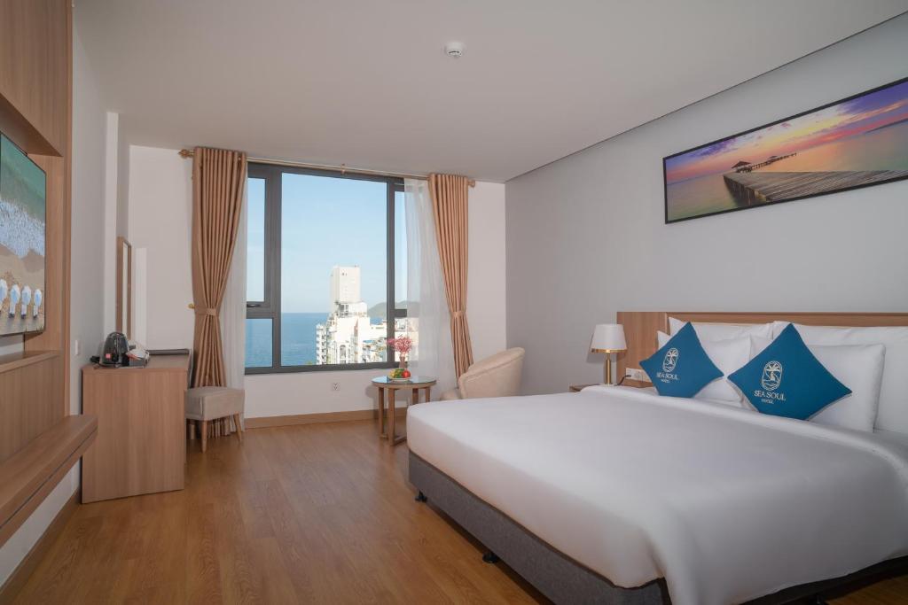 Giường trong phòng chung tại Sea Soul Hotel