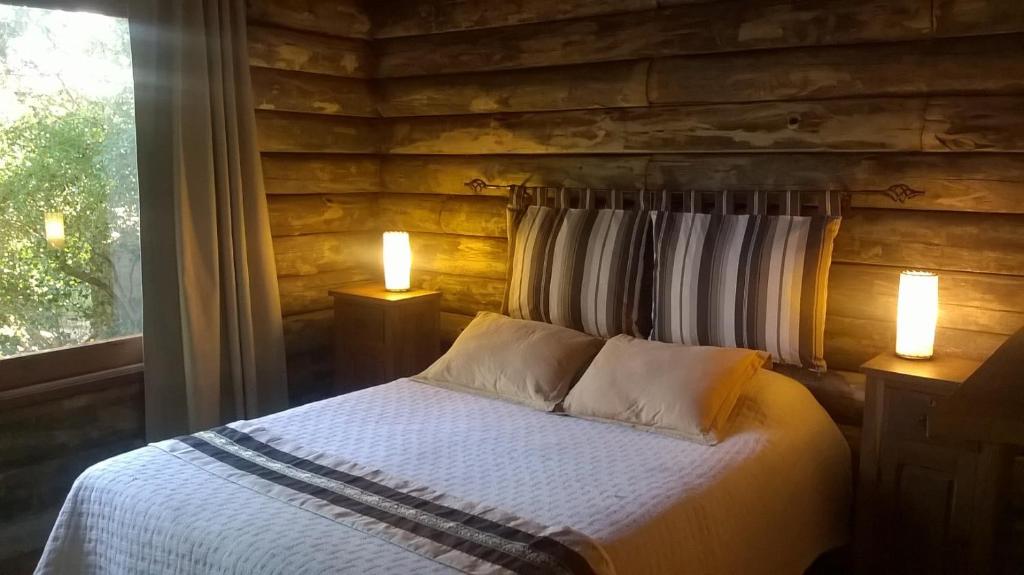 Postel nebo postele na pokoji v ubytování Cabaña Navajuá