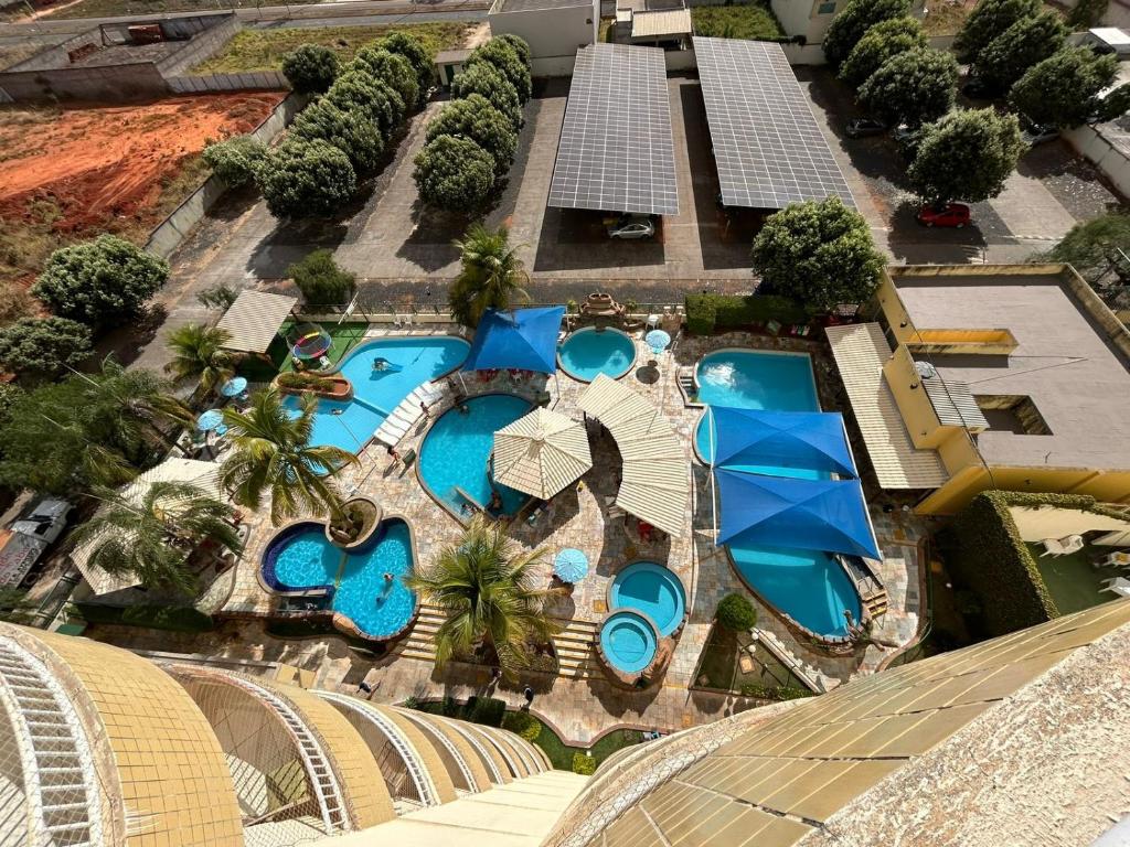 an aerial view of a resort with a swimming pool at Thermas place 406 in Caldas Novas