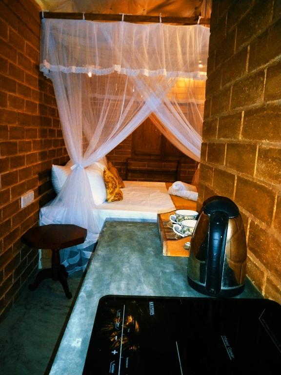 Postel nebo postele na pokoji v ubytování Lunuvila Resort Hiriketiya Dikwella
