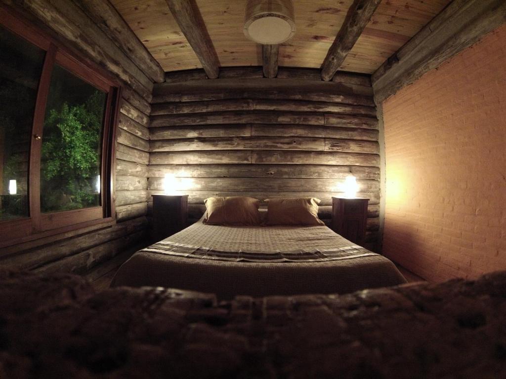 Postel nebo postele na pokoji v ubytování Cabaña Navajuá