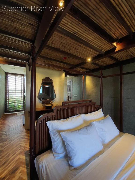 Postel nebo postele na pokoji v ubytování MINH - CASA