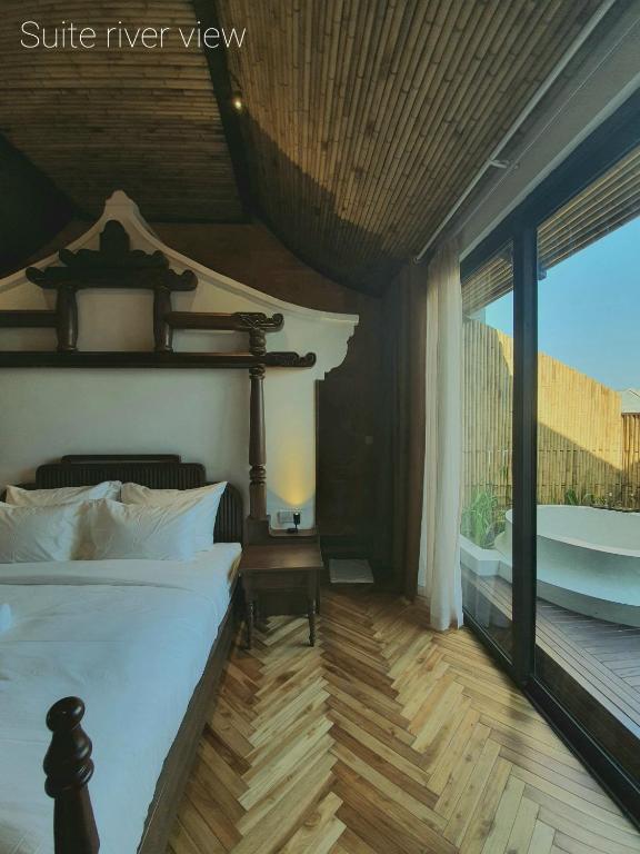 Postel nebo postele na pokoji v ubytování MINH - CASA