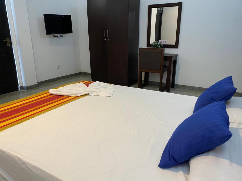 Postel nebo postele na pokoji v ubytování Nade Villas Ahungalla
