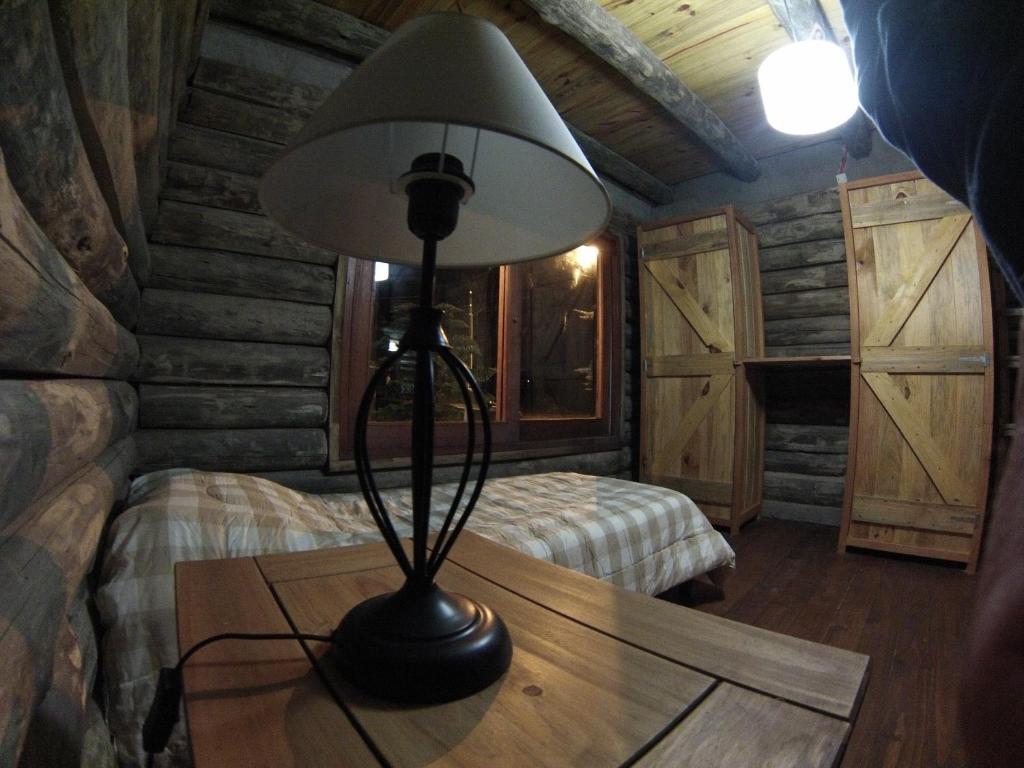 Postel nebo postele na pokoji v ubytování Cabaña Navajuá