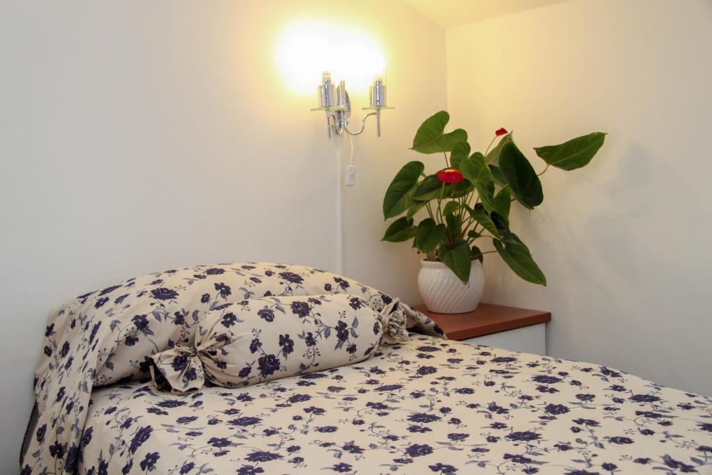Postel nebo postele na pokoji v ubytování Hotel Villa Neretva - Metković