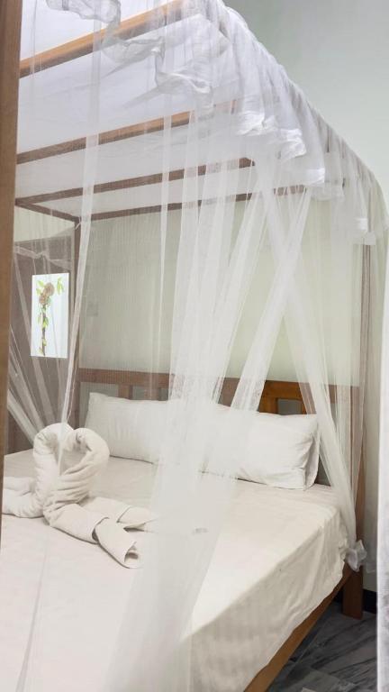 Postel nebo postele na pokoji v ubytování Sigiriya Nature View home Stay