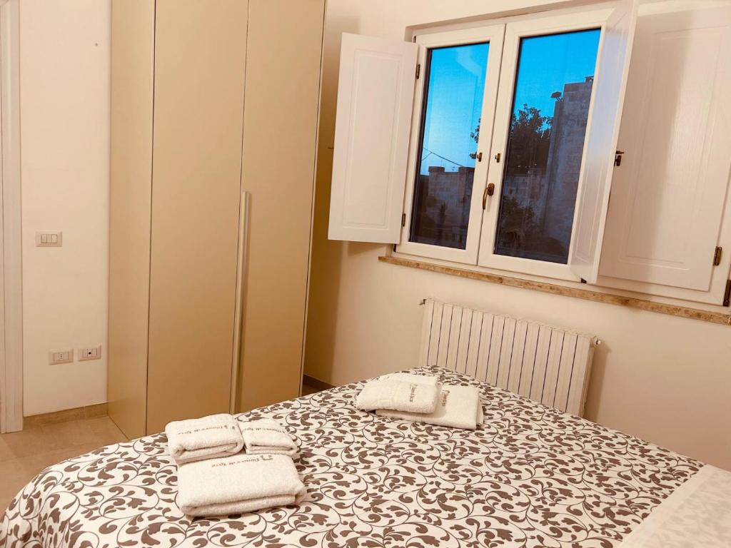 Postel nebo postele na pokoji v ubytování Dimore di Lecce - La Corte