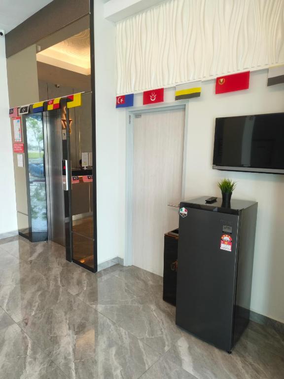 TV a/nebo společenská místnost v ubytování Hotel Golden View Nilai