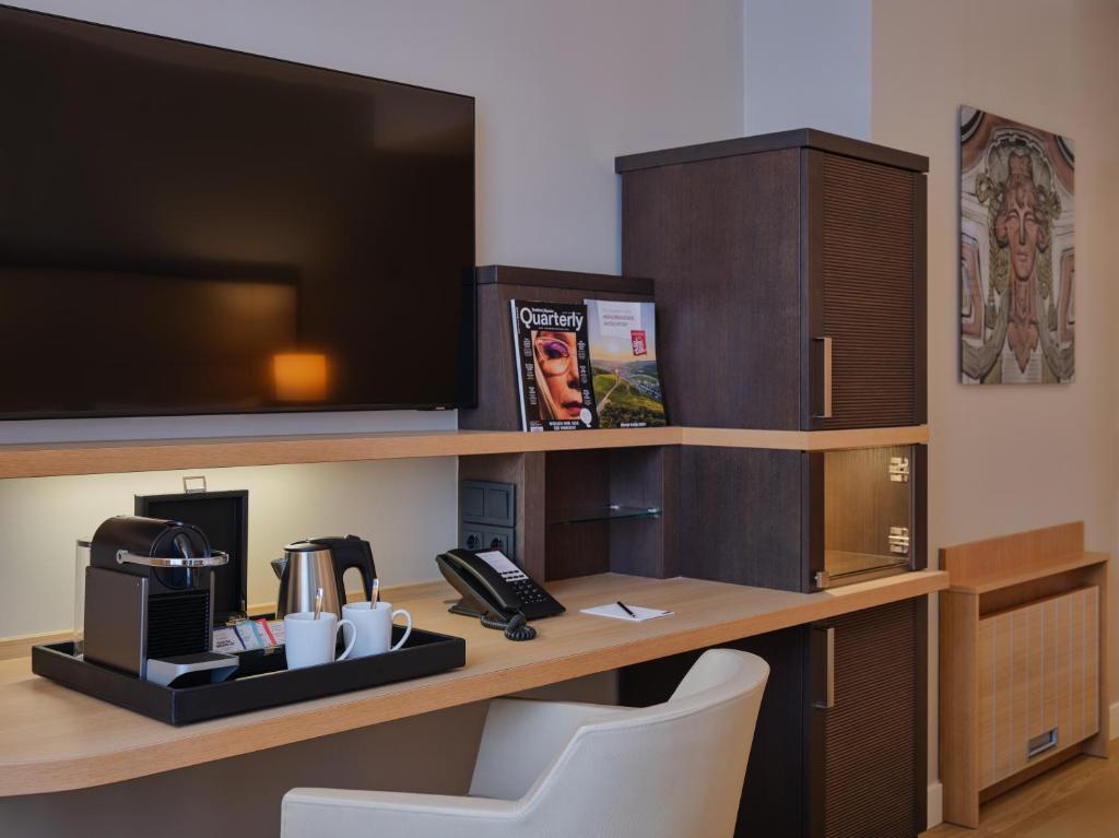 TV a/nebo společenská místnost v ubytování Steigenberger Hotel Bad Neuenahr