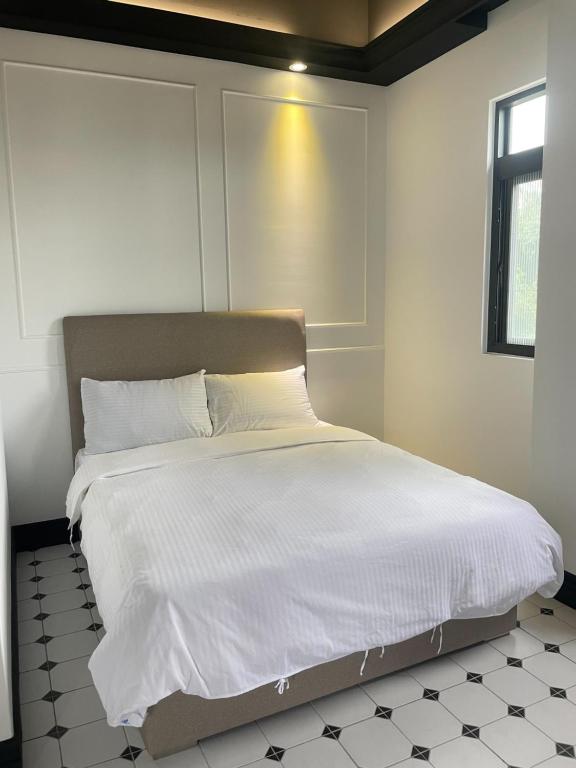 Letto o letti in una camera di Stroll at Wudao Inn