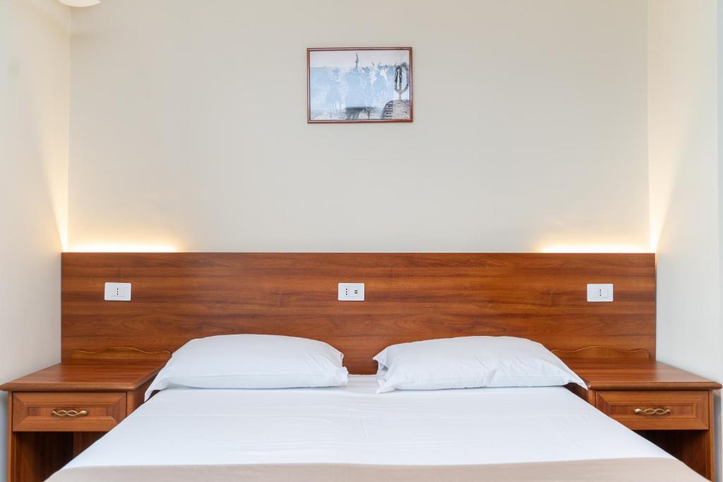 Postel nebo postele na pokoji v ubytování B&B Gusto West