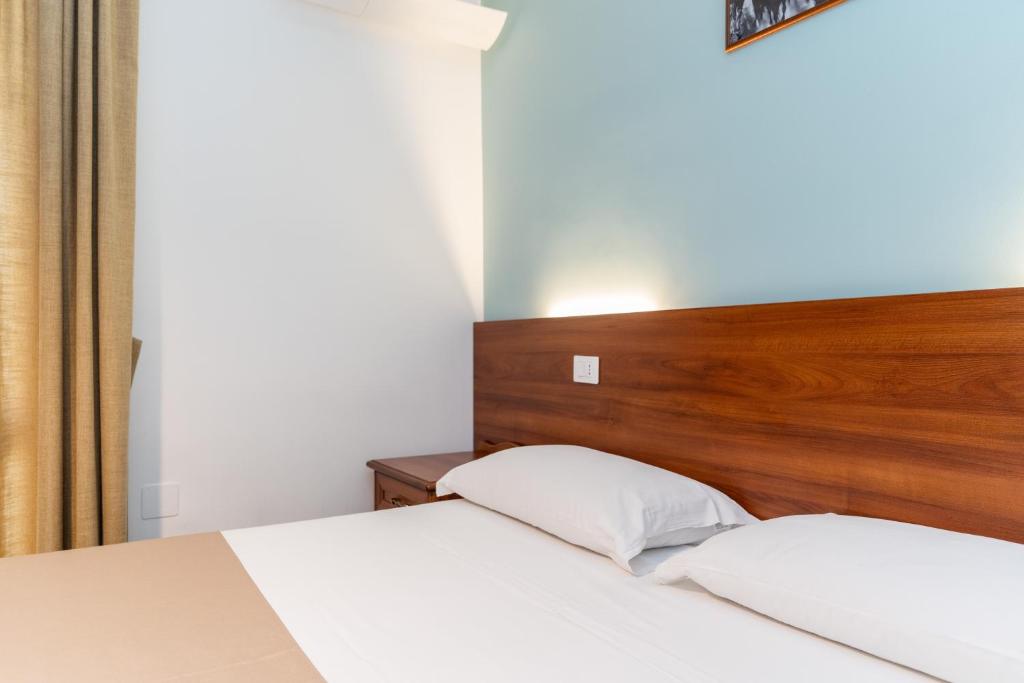 Postel nebo postele na pokoji v ubytování B&B Gusto West