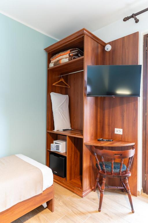 TV a/nebo společenská místnost v ubytování B&B Gusto West