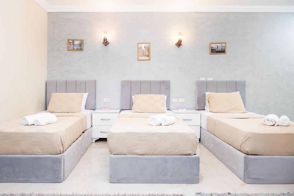 Postel nebo postele na pokoji v ubytování THE GEM VIEW BOUTIQUE