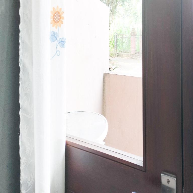 Fotografie z fotogalerie ubytování RedDoorz at Cbreez Bitung v destinaci Bitung