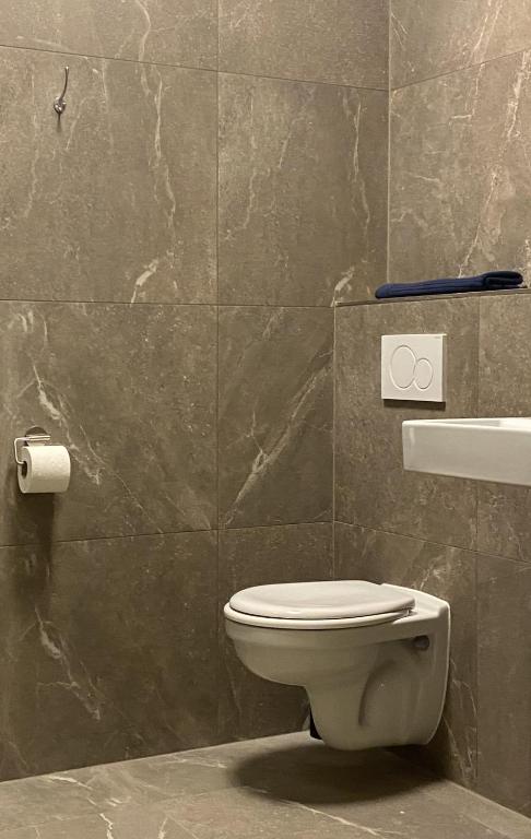 Koupelna v ubytování Logement Sylroede