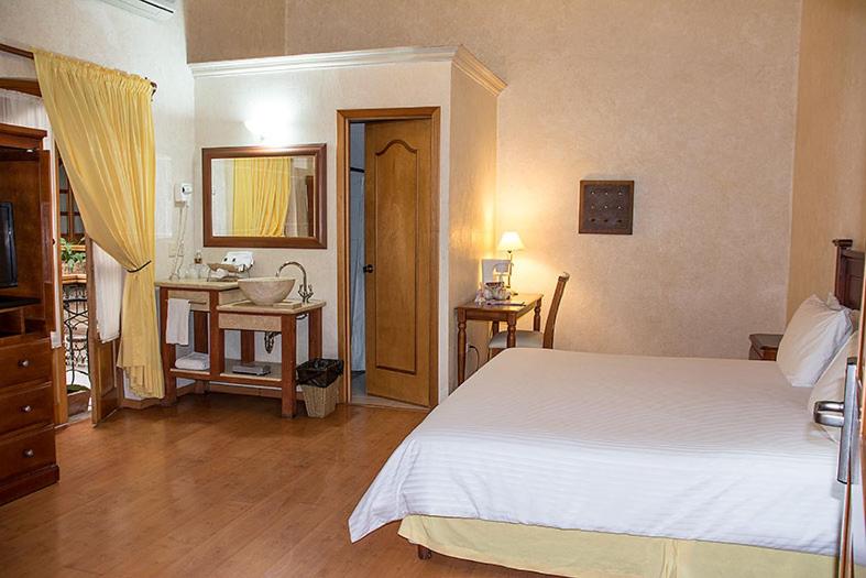 Voodi või voodid majutusasutuse Hostal de La Monja toas