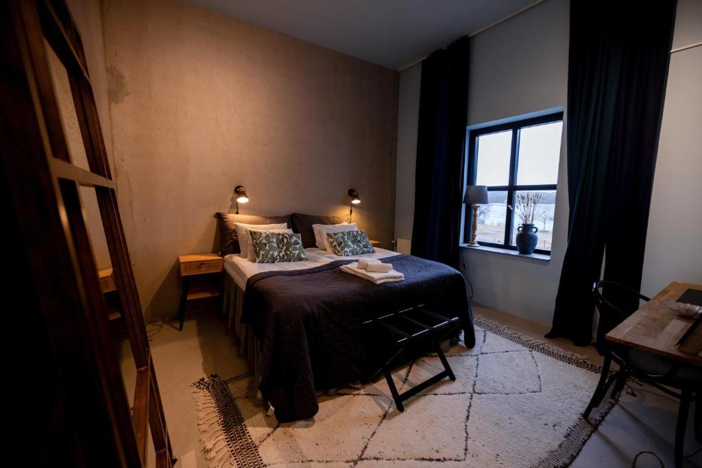 Postel nebo postele na pokoji v ubytování Sångbergs Hotell