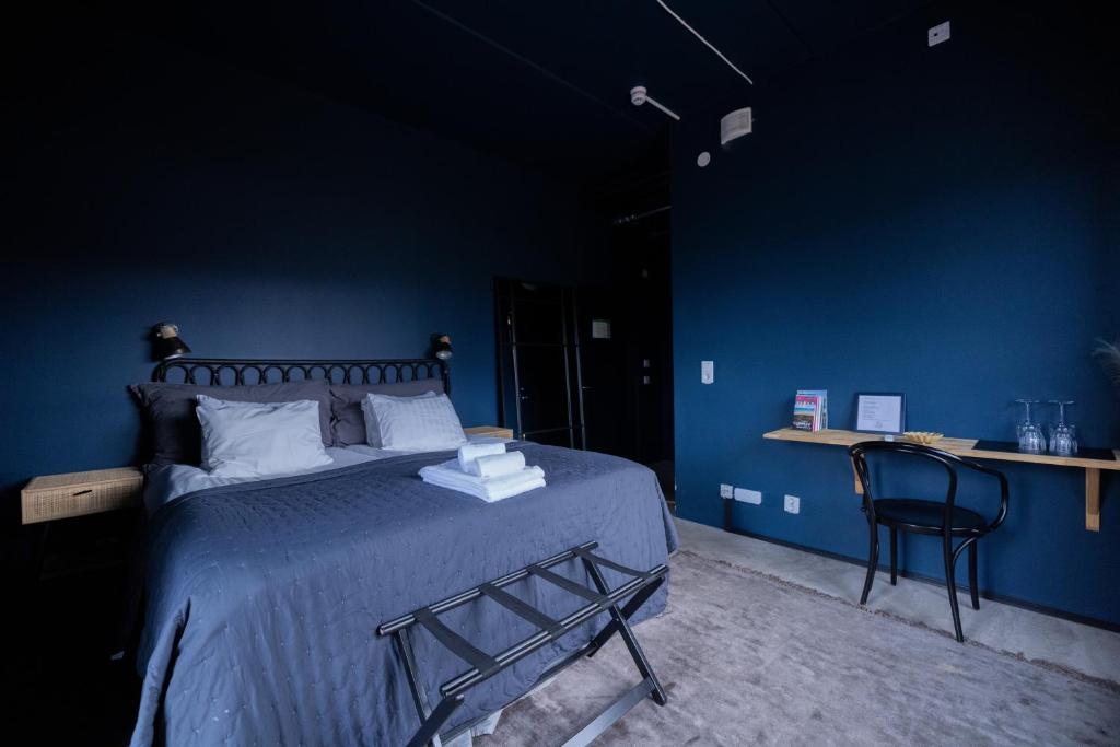 Postel nebo postele na pokoji v ubytování Sångbergs Hotell