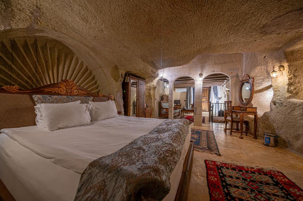 Postel nebo postele na pokoji v ubytování Gamirasu Village House