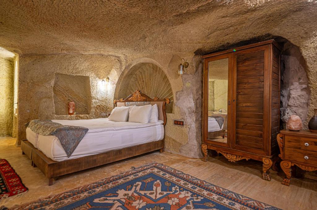 Postel nebo postele na pokoji v ubytování Gamirasu Village House