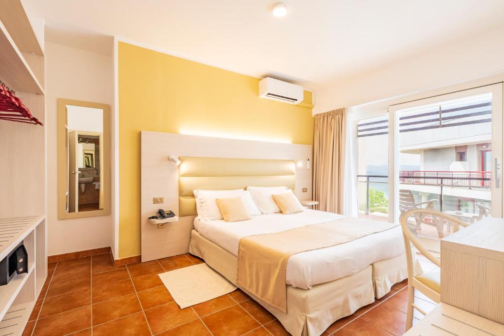 Postel nebo postele na pokoji v ubytování Hotel Florida