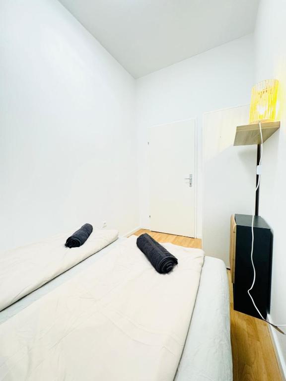 Comfy Rooms in a Shared Apt, 8Min to Rathausplatzにあるベッド