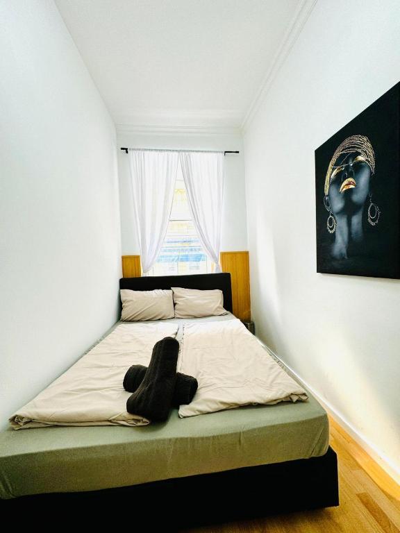 Comfy Rooms in a Shared Apt, 8Min to Rathausplatzにあるベッド