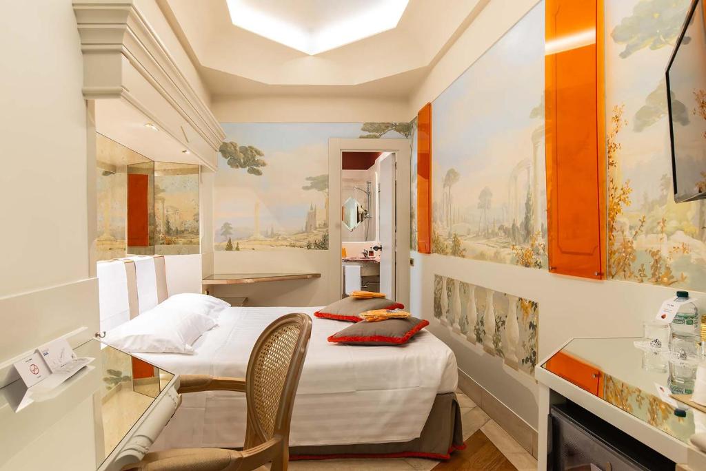 A bed or beds in a room at Hotel Isa