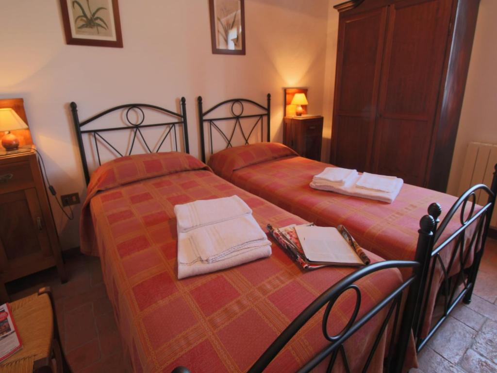 Posteľ alebo postele v izbe v ubytovaní Traditional Farmhouse in Toscana with Swimming Pool