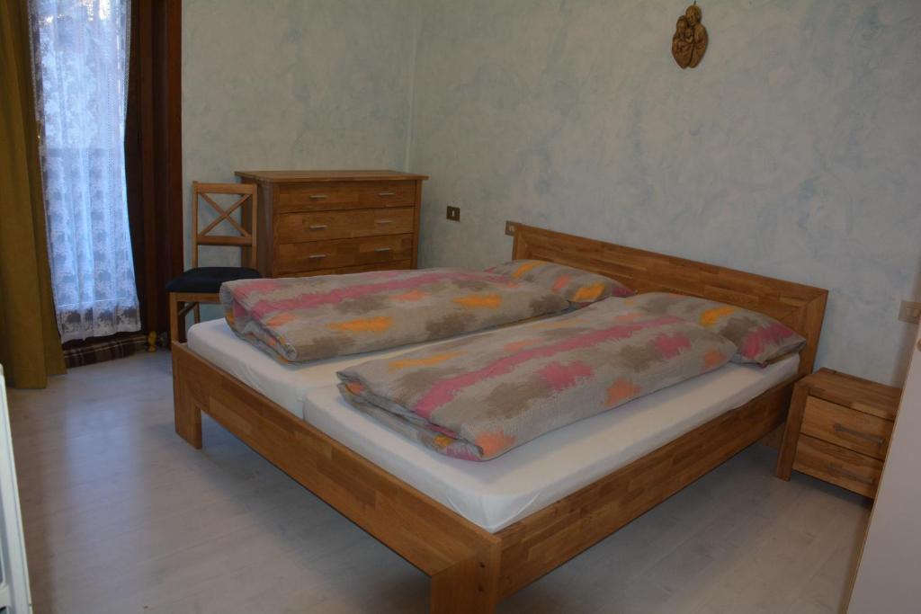 Łóżko lub łóżka w pokoju w obiekcie Chalet Rin Star