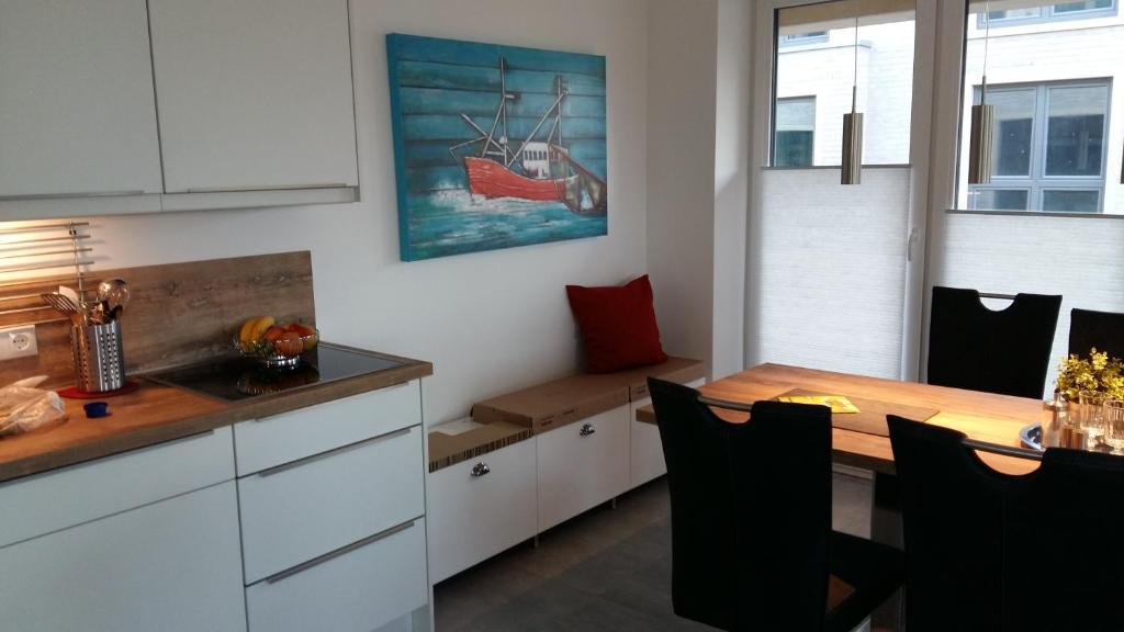Kuchyň nebo kuchyňský kout v ubytování watn Meerblick-Nordseepark Dangast, 2Schlafzimmer,2Bäder,Kamin,Parkplatz