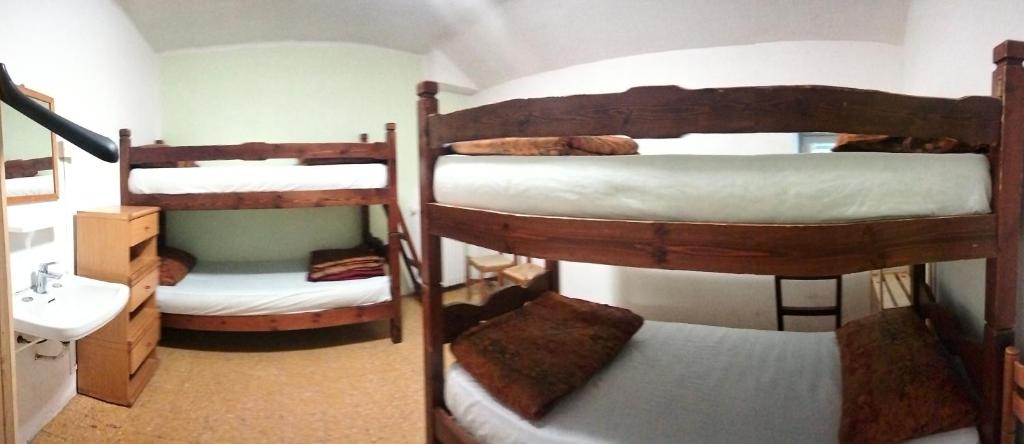 Posteľ alebo postele v izbe v ubytovaní Rifugio La Capanna