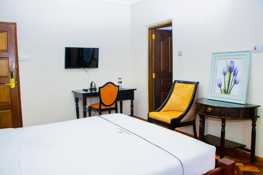 TV a/nebo společenská místnost v ubytování The Blixen Resort & Spa