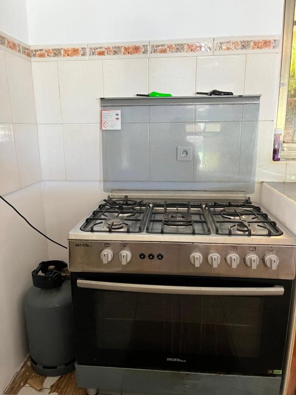 Kuchyň nebo kuchyňský kout v ubytování Fare Tiare - Maison Taha’a