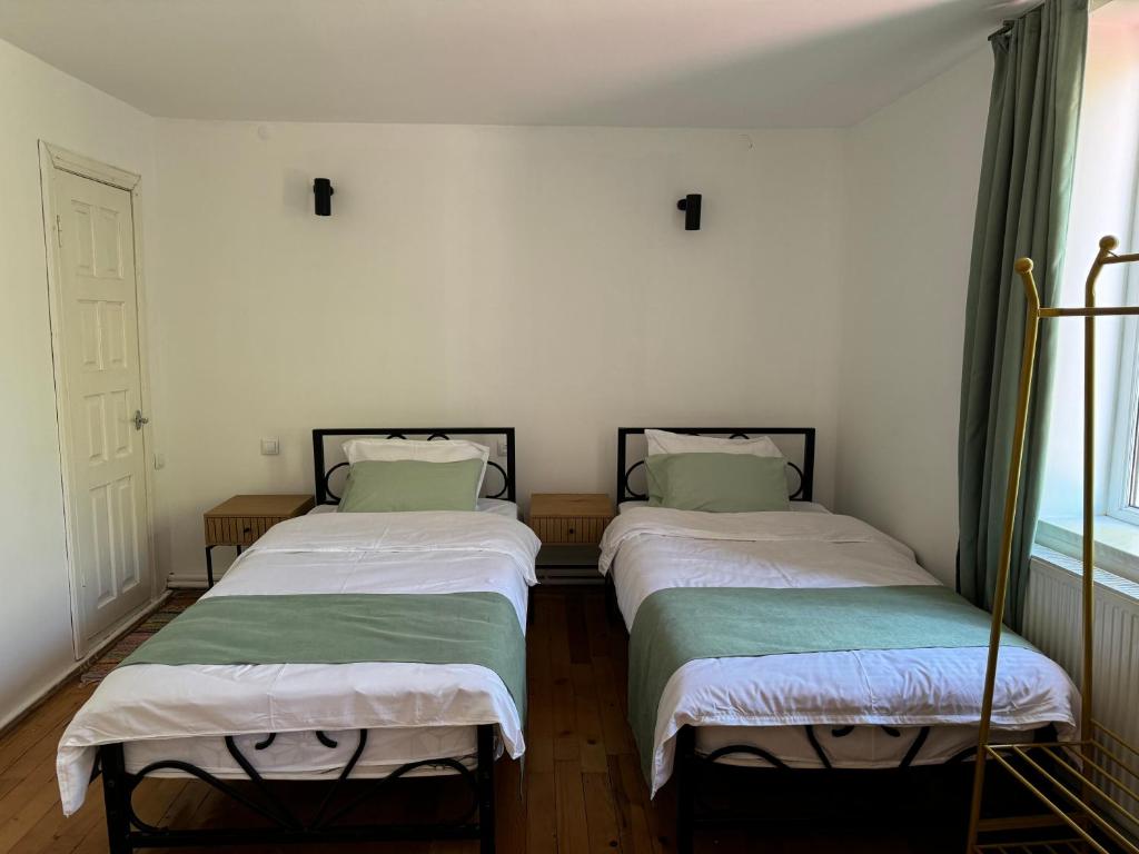 Postel nebo postele na pokoji v ubytování Kantora19