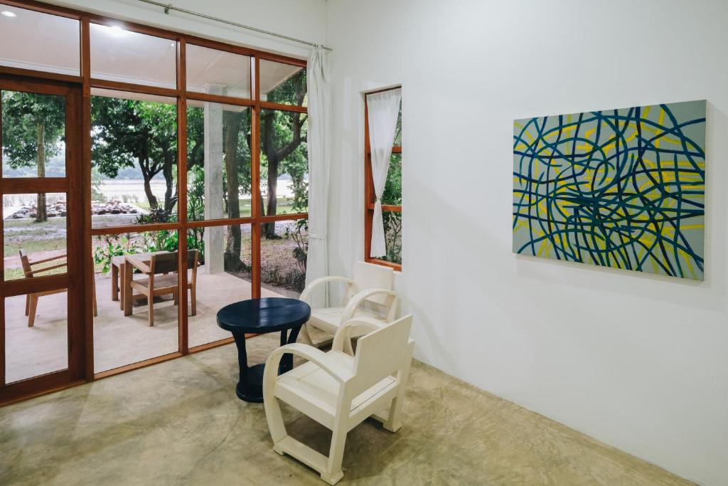 Posezení v ubytování Loogmai Guesthouse Chiang Khan - เรือนแรมลูกไม้ เชียงคาน