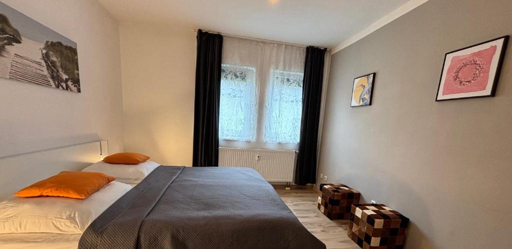 Postel nebo postele na pokoji v ubytování M&M Serviced Appartment