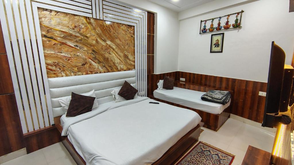 Postel nebo postele na pokoji v ubytování Bedweiser Backpackers Hostel