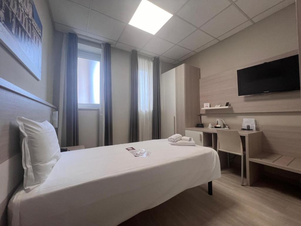 TV a/nebo společenská místnost v ubytování Best Quality Hotel La Darsena