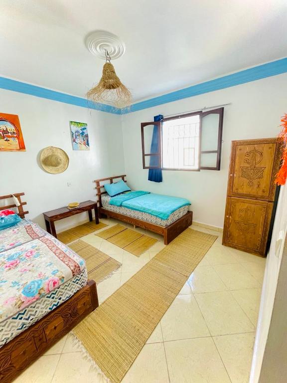 Postel nebo postele na pokoji v ubytování Binic surf house