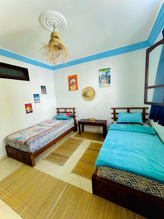 Postel nebo postele na pokoji v ubytování Binic surf house