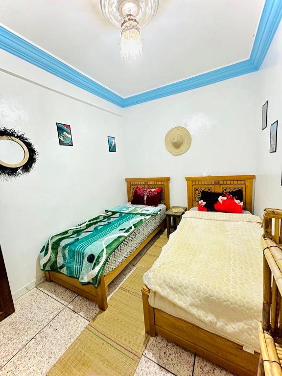 Postel nebo postele na pokoji v ubytování Binic surf house