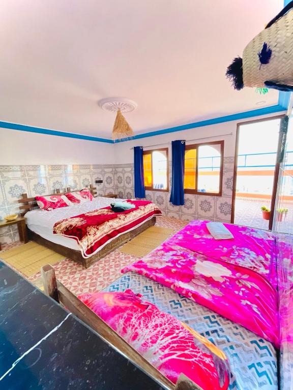Postel nebo postele na pokoji v ubytování Binic surf house