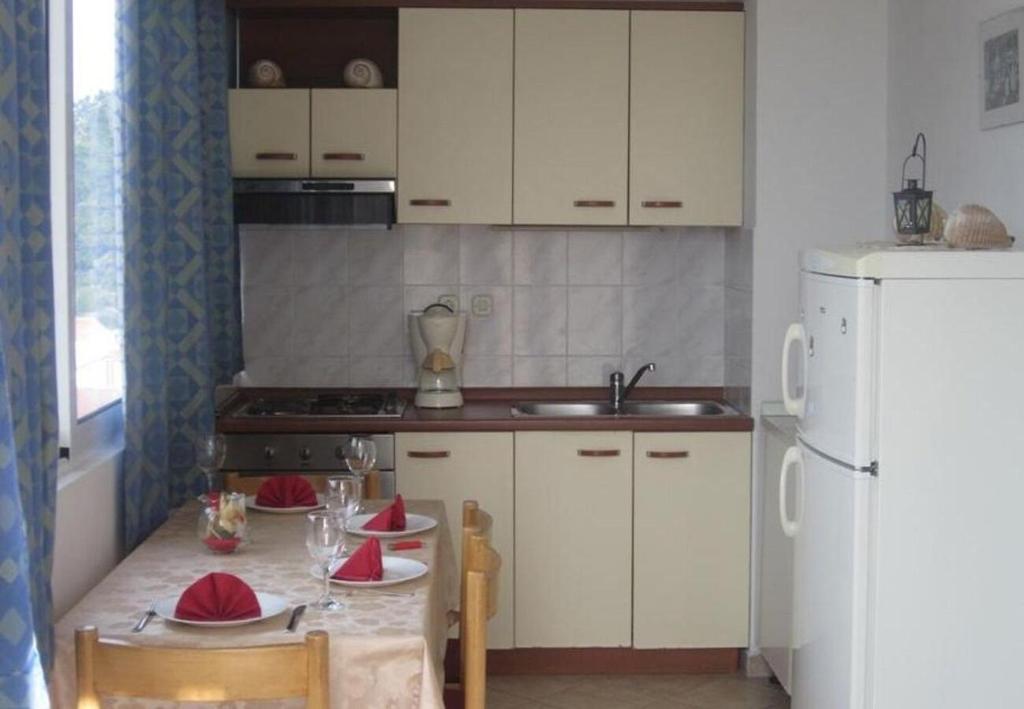 Kuchnia lub aneks kuchenny w obiekcie Apartments and Room Dar